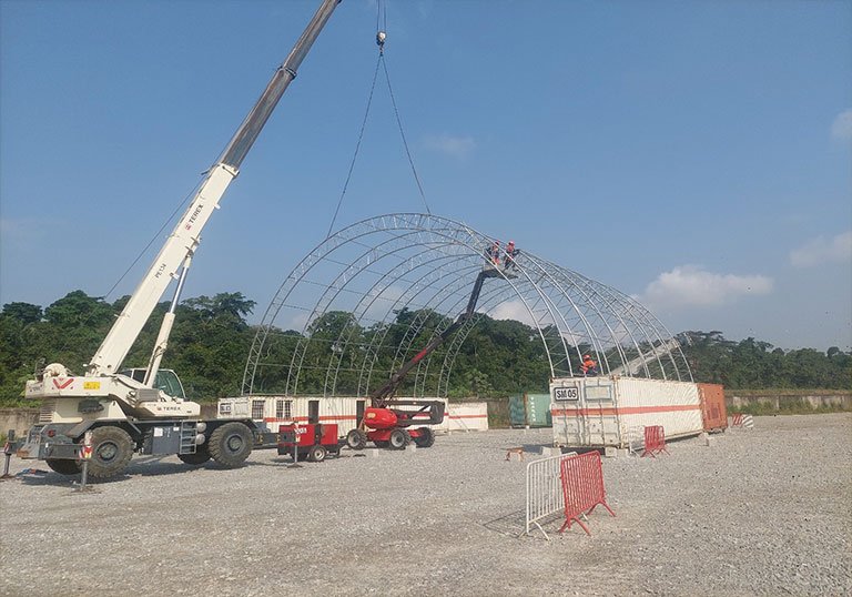 what standard size of hoop barn and what material the fabric building use for